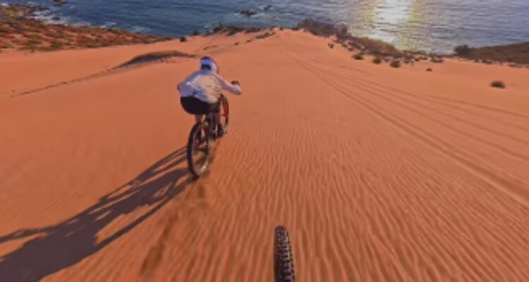 Municipio denunciará a dos ciclistas europeos que se grabaron descendiendo por dunas de Concón